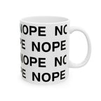 An 11 oz white ceramic mug with a repeating black text pattern reading 'NOPE' on a clean white background.