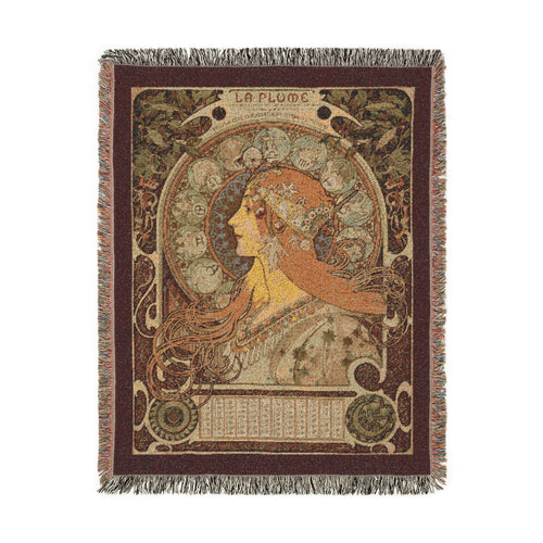 A rectangular woven blanket with fringed edges featuring an Art Nouveau color lithograph by Alphonse Mucha called Zodiaque (“La Plume”), also known as Zodiac within a deep red border depicting a female profile surrounded by the twelve signs of the zodiac. Shown on a solid white background.