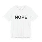 A white short-sleeve crewneck t-shirt with the word 'NOPE' printed in bold black capital letters across the chest, displayed on a clean white background.