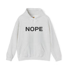 An ash gray pullover hoodie with the word 'NOPE' printed in bold black capital letters across the chest on a solid white background.
