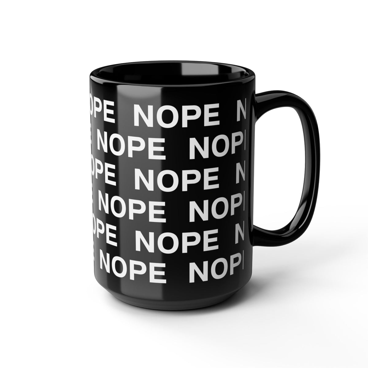 A glossy 15oz black ceramic mug with a repeating white text pattern reading 'NOPE' on a clean white background.