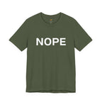 A military green short-sleeve crewneck t-shirt with the word 'NOPE' printed in bold white capital letters across the chest, displayed on a clean white background.