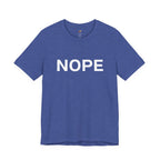 A heather true royal blue short-sleeve crewneck t-shirt with the word 'NOPE' printed in bold white capital letters across the chest, displayed on a clean white background.